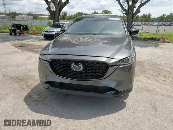 ✅ 2022 Mazda CX-5 2.5 Turbo • VIN: JM3KFBAY6N0607767 • Лот: 71276325. Опубликован ранее на Copart с пробегом 63 133 миль. Бесплатный доступ к архиву аукционных продаж из США и подробный отчёт об истории автомобиля на DreamBid. Изображение 14.