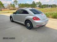 ✅ 2013 Volkswagen Beetle 2.5L • VIN: 3VWJX7AT3DM663774 • Lot: 85182775. Listed on Copart with 100,016 mi. Free auction sales archive from the USA and detailed vehicle history report at DreamBid. Image 3.