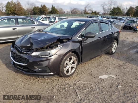 ✅ 2017 Chevrolet Cruze Premier • VIN: 1G1BF5SMXH7263614 • Lot: 37759633. Listed on Copart with 131,165 mi. Free auction sales archive from the USA and detailed vehicle history report at DreamBid. Image 1.