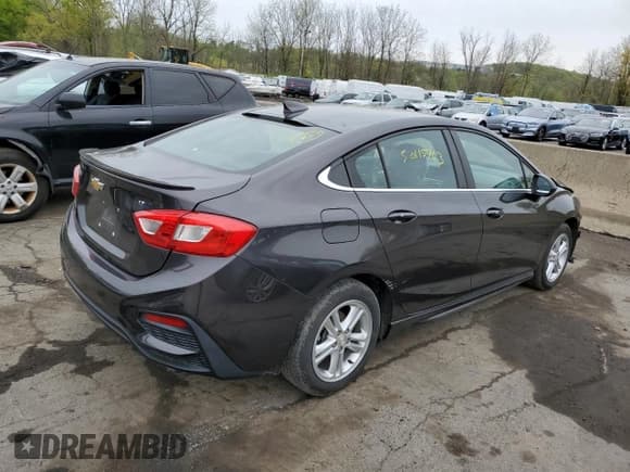 ✅ 2017 Chevrolet Cruze LT • VIN: 1G1BE5SMXH7187024 • Lot: 50115763. Listed on Copart with 68,915 mi. Free auction sales archive from the USA and detailed vehicle history report at DreamBid. Image 3.