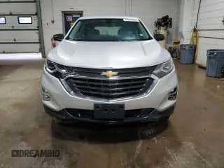 ✅ 2018 Chevrolet Equinox LS • VIN: 2GNAXREV9J6227986 • Lot: 89443525. Wystawiony na Copart z przebiegiem 98 497 mil. Bezpłatny archiwum sprzedaży aukcyjnych z USA i szczegółowy raport historii pojazdu na DreamBid. Zdjęcie 5.