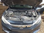 ✅ 2018 Honda Civic EX-T • VIN: JHMFC1F35JX021667 • Lot: 43778970. Listed on IAAI with 159,063 mi. Free auction sales archive from the USA and detailed vehicle history report at DreamBid. Image 10.