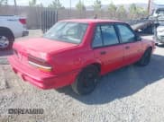 ✅ 1993 Pontiac Sunbird • VIN: 1G2JB54H5P7513942 • Lot: 43304962. Listed on IAAI with 126,707 mi. Free auction sales archive from the USA and detailed vehicle history report at DreamBid. Image 4.