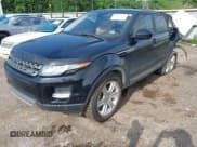✅ 2015 Land Rover Range Rover Evoque Pure Premium • VIN: SALVR2BGXFH059920 • Lot: 42325121. Wystawiony na IAAI z przebiegiem 165 618 mil. Bezpłatny archiwum sprzedaży aukcyjnych z USA i szczegółowy raport historii pojazdu na DreamBid. Zdjęcie 18.