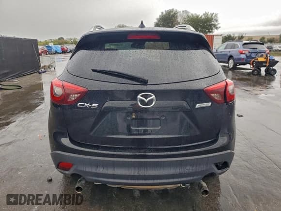✅ 2016 Mazda CX-5 Grand Touring • VIN: JM3KE2DY6G0700984 • Lot: 95326875. Listed on Copart with 244,245 mi. Free auction sales archive from the USA and detailed vehicle history report at DreamBid. Image 6.