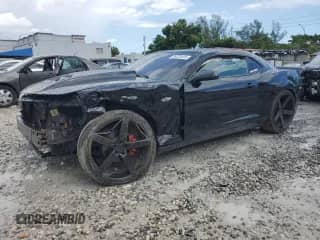 2013 Chevrolet Camaro LS с VIN 2G1FA1E38D9174600, выставлен на аукционе Copart как лот 84228435 с пробегом 90 370 миль миль и Списание • Salvage title. История ставок и продаж доступна на DreamBid. Изображение 1.