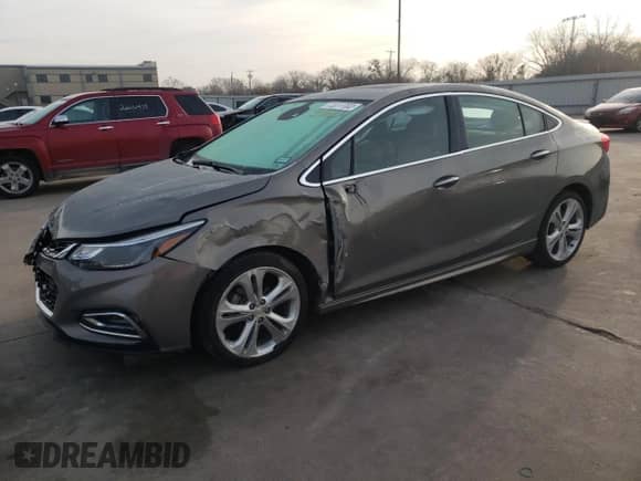 2017 Chevrolet Cruze Premier z VIN 1G1BF5SM4H7234609, wystawiony jako Copart lot #72077702 z przebiegiem 139 650 mil mil oraz . Historia ofert i sprzedaży dostępna na DreamBid. Obrazek 1.