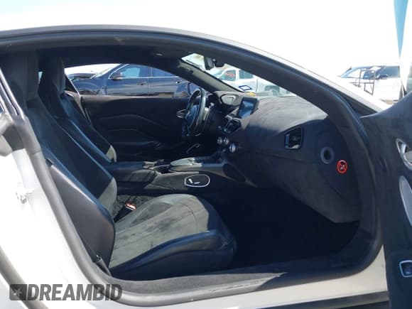 ✅ 2019 Aston Martin Vantage • VIN: SCFSMGAW4KGN01848 • Lot: 42032076. Wystawiony na IAAI z przebiegiem 54 469 mil. Bezpłatny archiwum sprzedaży aukcyjnych z USA i szczegółowy raport historii pojazdu na DreamBid. Zdjęcie 5.