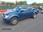 ✅ 2014 Nissan Frontier SV • VIN: 1N6AD0ER2EN767100 • Lot: 43213268. Listed on IAAI with 116,153 mi. Free auction sales archive from the USA and detailed vehicle history report at DreamBid. Image 2.