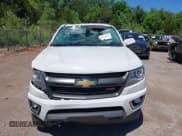 ✅ 2020 Chevrolet Colorado 4WD Z71 • VIN: 1GCGTDEN7L1100080 • Лот: 42307462. Опубликован ранее на IAAI с пробегом 93 207 миль. Бесплатный доступ к архиву аукционных продаж из США и подробный отчёт об истории автомобиля на DreamBid. Изображение 12.