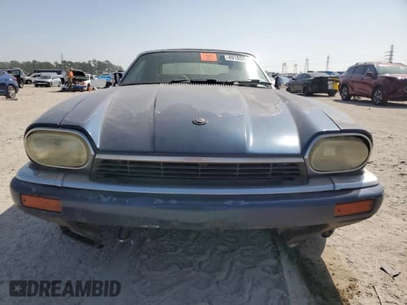 ✅ 1995 Jaguar XJS • VIN: SAJNX2748SC221676 • Lot: 49185945. Wystawiony na Copart z przebiegiem 160 087 mil. Bezpłatny archiwum sprzedaży aukcyjnych z USA i szczegółowy raport historii pojazdu na DreamBid. Zdjęcie 5.