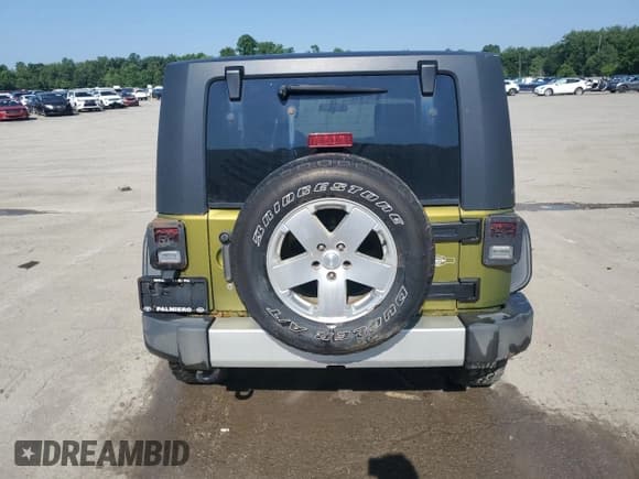 ✅ 2010 Jeep Wrangler Sahara • VIN: 1J4AA5D16AL203910 • Lot: 62891315. Wystawiony na Copart z przebiegiem 124 337 mil. Bezpłatny archiwum sprzedaży aukcyjnych z USA i szczegółowy raport historii pojazdu na DreamBid. Zdjęcie 6.