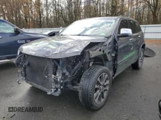 ✅ 2018 Jeep Grand Cherokee Overland • VIN: 1C4RJFCG4JC309597 • Лот: 91555105. Опубликован ранее на Copart с пробегом 100 224 миль. Бесплатный доступ к архиву аукционных продаж из США и подробный отчёт об истории автомобиля на DreamBid. Изображение 1.