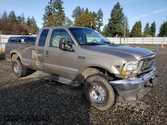 ✅ 2002 Ford F-250 XL • VIN: 1FTNX21S92EA70079 • Lot: 91107245. Listed on Copart with Not provided. Free auction sales archive from the USA and detailed vehicle history report at DreamBid. Image 4.