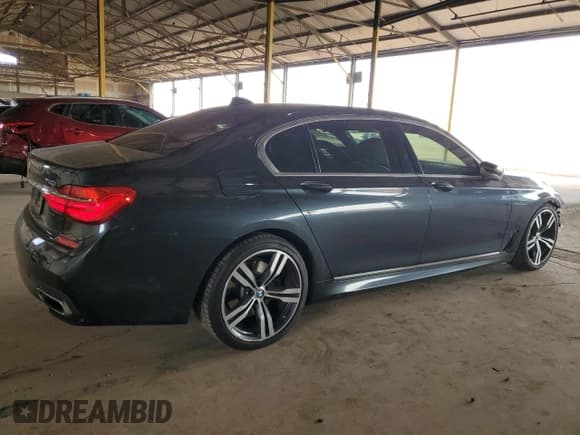 ✅ 2017 BMW 7 Series 750i • VIN: WBA7F0C51HGM21410 • Lot: 80801545. Listed on Copart with 75,738 mi. Free auction sales archive from the USA and detailed vehicle history report at DreamBid. Image 3.