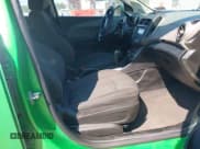 ✅ 2014 Chevrolet Sonic LT • VIN: 1G1JC5SH9E4224940 • Lot: 43197953. Listed on IAAI with 128,391 mi. Free auction sales archive from the USA and detailed vehicle history report at DreamBid. Image 5.