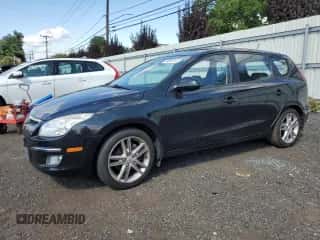 2009 Hyundai Elantra Touring z VIN KMHDC86E99U031713, wystawiony jako Copart lot #70644314 z przebiegiem 95 321 mil mil oraz Szkoda całkowita • Salvage title. Historia ofert i sprzedaży dostępna na DreamBid. Obrazek 1.