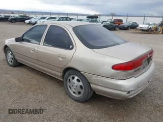 ✅ 1999 Mercury Mystique GS • VIN: 1MEFM6538XK606647 • Лот: 41613999. Опубликован ранее на IAAI с пробегом 90 978 миль. Бесплатный доступ к архиву аукционных продаж из США и подробный отчёт об истории автомобиля на DreamBid. Изображение 3.
