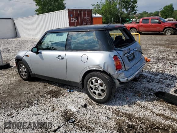 ✅ 2004 MINI Hardtop • VIN: WMWRC33434TJ56260 • Lot: 57022385. Wystawiony na Copart z przebiegiem 98 498 mil. Bezpłatny archiwum sprzedaży aukcyjnych z USA i szczegółowy raport historii pojazdu na DreamBid. Zdjęcie 2.