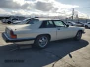✅ 1986 Jaguar XJ • VIN: SAJNV584XGC134035 • Lot: 56906985. Wystawiony na Copart z przebiegiem 22 429 mil. Bezpłatny archiwum sprzedaży aukcyjnych z USA i szczegółowy raport historii pojazdu na DreamBid. Zdjęcie 3.