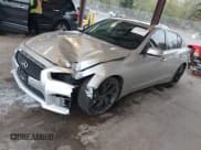 ✅ 2015 Infiniti Q50 Premium • VIN: JN1BV7AP3FM335210 • Lot: 43711853. Listed on IAAI with 102,947 mi. Free auction sales archive from the USA and detailed vehicle history report at DreamBid. Image 2.