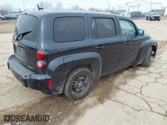 ✅ 2011 Chevrolet HHR LS • VIN: 3GNBAAFW1BS560779 • Lot: 41590007. Listed on IAAI with 209,181 mi. Free auction sales archive from the USA and detailed vehicle history report at DreamBid. Image 4.