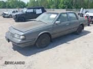 ✅ 1989 Oldsmobile Cutlass Ciera • VIN: 2G3AJ51NXK2439345 • Lot: 42128301. Wystawiony na IAAI z przebiegiem 241 434 mil. Bezpłatny archiwum sprzedaży aukcyjnych z USA i szczegółowy raport historii pojazdu na DreamBid. Zdjęcie 2.