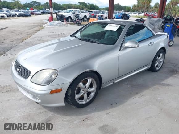 ✅ 2001 Mercedes-Benz SLK 230/320 • VIN: WDBKK65F81F185298 • Lot: 42963336. Listed on IAAI with 73,700 mi. Free auction sales archive from the USA and detailed vehicle history report at DreamBid. Image 2.