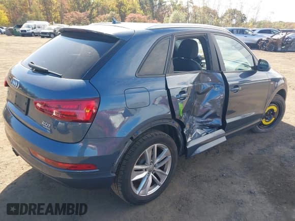 ✅ 2018 Audi Q3 Premium • VIN: WA1ECCFS7JR002472 • Lot: 43434394. Wystawiony na IAAI z przebiegiem 59 726 mil. Bezpłatny archiwum sprzedaży aukcyjnych z USA i szczegółowy raport historii pojazdu na DreamBid. Zdjęcie 6.
