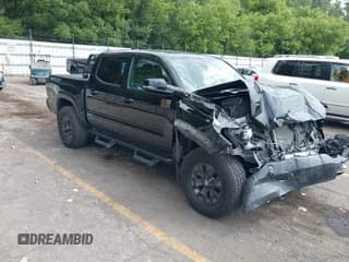 ✅ 2023 Toyota Tacoma SR • VIN: 3TMCZ5AN2PM585925 • Lot: 43009810. Listed on IAAI with 43,671 mi. Free auction sales archive from the USA and detailed vehicle history report at DreamBid. Image 1.