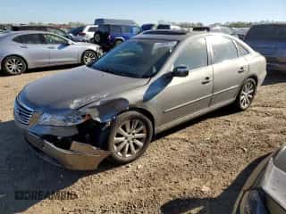 2009 Hyundai Azera Limited z VIN KMHFC46F09A381047, wystawiony jako Copart lot #71802614 z przebiegiem 106 632 mil mil oraz Szkoda całkowita • Salvage title. Historia ofert i sprzedaży dostępna na DreamBid. Obrazek 1.