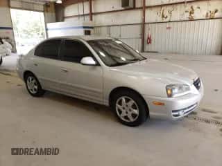 2004 Hyundai Elantra GLS z VIN KMHDN46D54U730968, wystawiony jako Copart lot #76198184 z przebiegiem 137 907 mil mil oraz Szkoda całkowita • Salvage title. Historia ofert i sprzedaży dostępna na DreamBid. Obrazek 4.