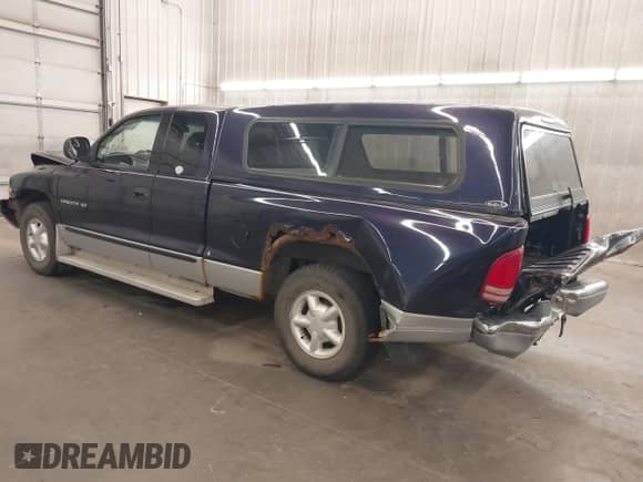 1998 Dodge Dakota SLT with VIN 1B7GL22Y6WS625035, listed as a IAAI auction lot 43223662 with 147,468 mi miles and . Bid and sale history available at DreamBid. Image 3.