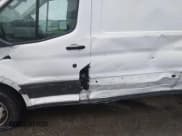 ✅ 2020 Ford Transit Cargo • VIN: 1FTBR1X82LKB60762 • Lot: 41572948. Listed on IAAI with 112,050 mi. Free auction sales archive from the USA and detailed vehicle history report at DreamBid. Image 6.