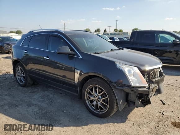 ✅ 2015 Cadillac SRX Performance Collection • VIN: 3GYFNFE33FS629992 • Lot: 82061395. Listed on Copart with 111,944 mi. Free auction sales archive from the USA and detailed vehicle history report at DreamBid. Image 4.