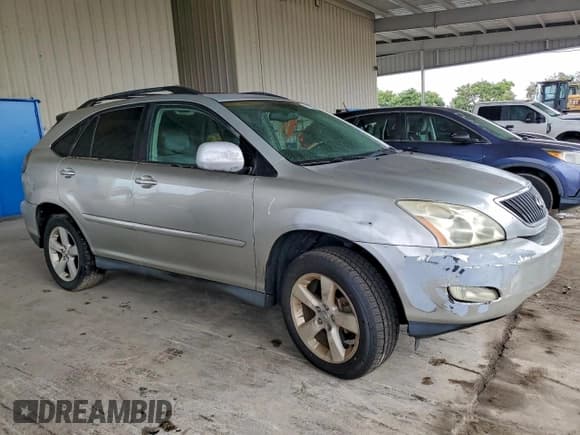 ✅ 2004 Lexus RX 330 • VIN: 2T2GA31U14C013040 • Lot: 96286615. Listed on Copart with 128,039 mi. Free auction sales archive from the USA and detailed vehicle history report at DreamBid. Image 4.
