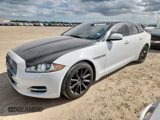 ✅ 2013 Jaguar XJ • VIN: SAJWA1C7XD8V57304 • Лот: 92613725. Опубликован ранее на Copart с пробегом 143 736 миль. Бесплатный доступ к архиву аукционных продаж из США и подробный отчёт об истории автомобиля на DreamBid. Изображение 1.