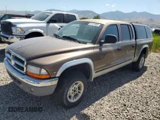2000 Dodge Dakota Sport с VIN 1B7GG2AN6YS699196, выставлен на аукционе Copart как лот 64131805 с пробегом 192 789 миль миль и Чистый • Clean title. История ставок и продаж доступна на DreamBid. Изображение 1.