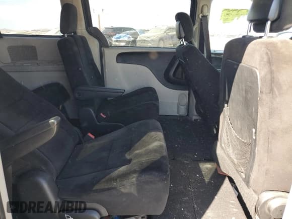 ✅ 2013 Dodge Grand Caravan SXT • VIN: 2C4RDGCG9DR678707 • Лот: 80993925. Опубликован ранее на Copart с пробегом 264 302 миль. Бесплатный доступ к архиву аукционных продаж из США и подробный отчёт об истории автомобиля на DreamBid. Изображение 11.