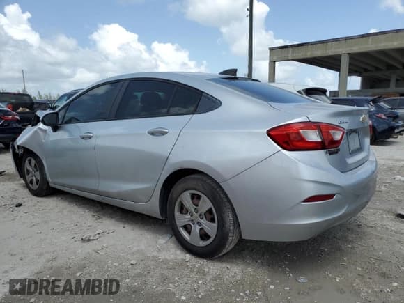 ✅ 2018 Chevrolet Cruze LS • VIN: 1G1BC5SM0J7103630 • Lot: 64805503. Listed on Copart with 124,430 mi. Free auction sales archive from the USA and detailed vehicle history report at DreamBid. Image 2.