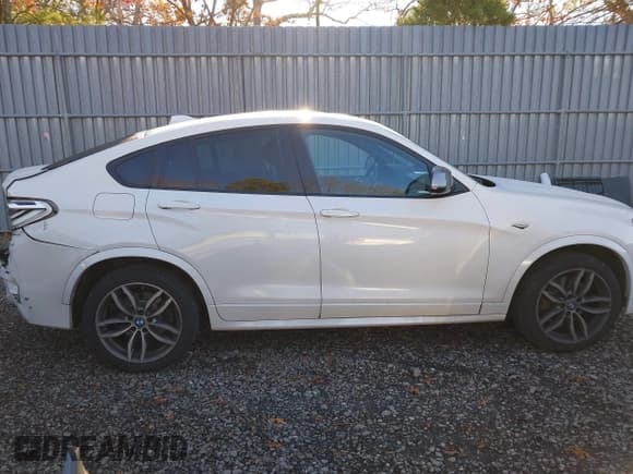 ✅ 2016 BMW X4 M40i • VIN: 5UXXW7C55G0M91316 • Lot: 43771718. Listed on IAAI with 132,706 mi. Free auction sales archive from the USA and detailed vehicle history report at DreamBid. Image 13.