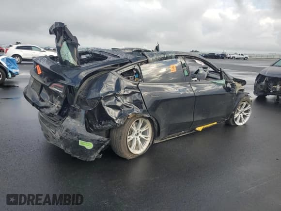 ✅ 2023 Tesla Model Y Long Range • VIN: 7SAYGAEE0PF621018 • Лот: 92168355. Опубликован ранее на Copart с пробегом Не указан. Бесплатный доступ к архиву аукционных продаж из США и подробный отчёт об истории автомобиля на DreamBid. Изображение 3.