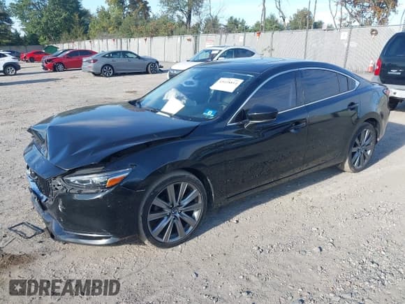 ✅ 2018 Mazda 6 Touring • VIN: JM1GL1VM9J1313051 • Lot: 43428814. Wystawiony na IAAI z przebiegiem 119 461 mil. Bezpłatny archiwum sprzedaży aukcyjnych z USA i szczegółowy raport historii pojazdu na DreamBid. Zdjęcie 2.