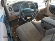 ✅ 2000 Mazda B-Series SE • VIN: 4F4YR16X2YTM09993 • Lot: 69090554. Wystawiony na Copart z przebiegiem 214 533 mil. Bezpłatny archiwum sprzedaży aukcyjnych z USA i szczegółowy raport historii pojazdu na DreamBid. Zdjęcie 8.