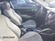 ✅ 2012 Hyundai Veloster w/Gray Int • VIN: KMHTC6AD0CU079347 • Лот: 43788046. Опубликован ранее на IAAI с пробегом 141 740 миль. Бесплатный доступ к архиву аукционных продаж из США и подробный отчёт об истории автомобиля на DreamBid. Изображение 5.