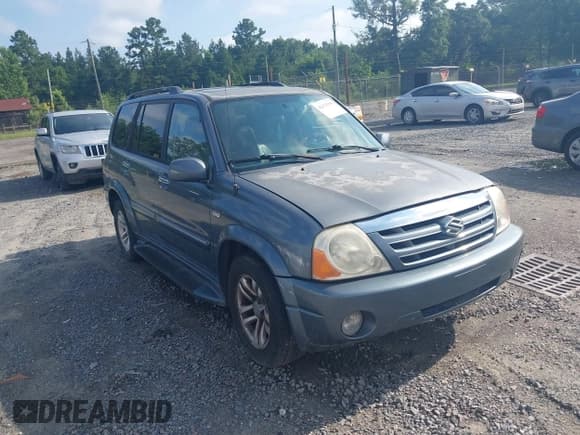 ✅ 2006 Suzuki XL7 • VIN: JS3TY92V964100782 • Lot: 42678396. Listed on IAAI with 218,621 mi. Free auction sales archive from the USA and detailed vehicle history report at DreamBid. Image 1.
