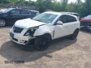 ✅ 2012 Cadillac SRX Premium Collection • VIN: 3GYFNFE39CS561614 • Lot: 42983043. Wystawiony na IAAI z przebiegiem 195 852 mil. Bezpłatny archiwum sprzedaży aukcyjnych z USA i szczegółowy raport historii pojazdu na DreamBid. Zdjęcie 2.