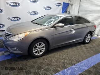✅ 2013 Hyundai Sonata GLS • VIN: 5NPEB4AC8DH579151 • Lot: 62319604. Listed on Copart with 144,124 mi. Free auction sales archive from the USA and detailed vehicle history report at DreamBid. Image 1.