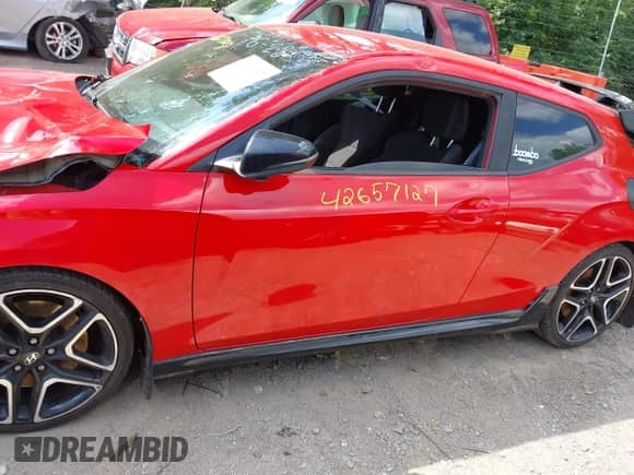 2020 Hyundai Veloster z VIN KMHT36AH0LU004909, wystawiony jako IAAI lot #42657127 z przebiegiem 86 557 mil mil oraz . Historia ofert i sprzedaży dostępna na DreamBid. Obrazek 14.