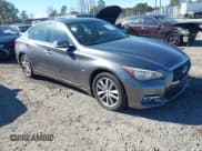 ✅ 2014 Infiniti Q50 Premium • VIN: JN1BV7ARXEM693629 • Lot: 43677891. Listed on IAAI with 224,891 mi. Free auction sales archive from the USA and detailed vehicle history report at DreamBid. Image 1.